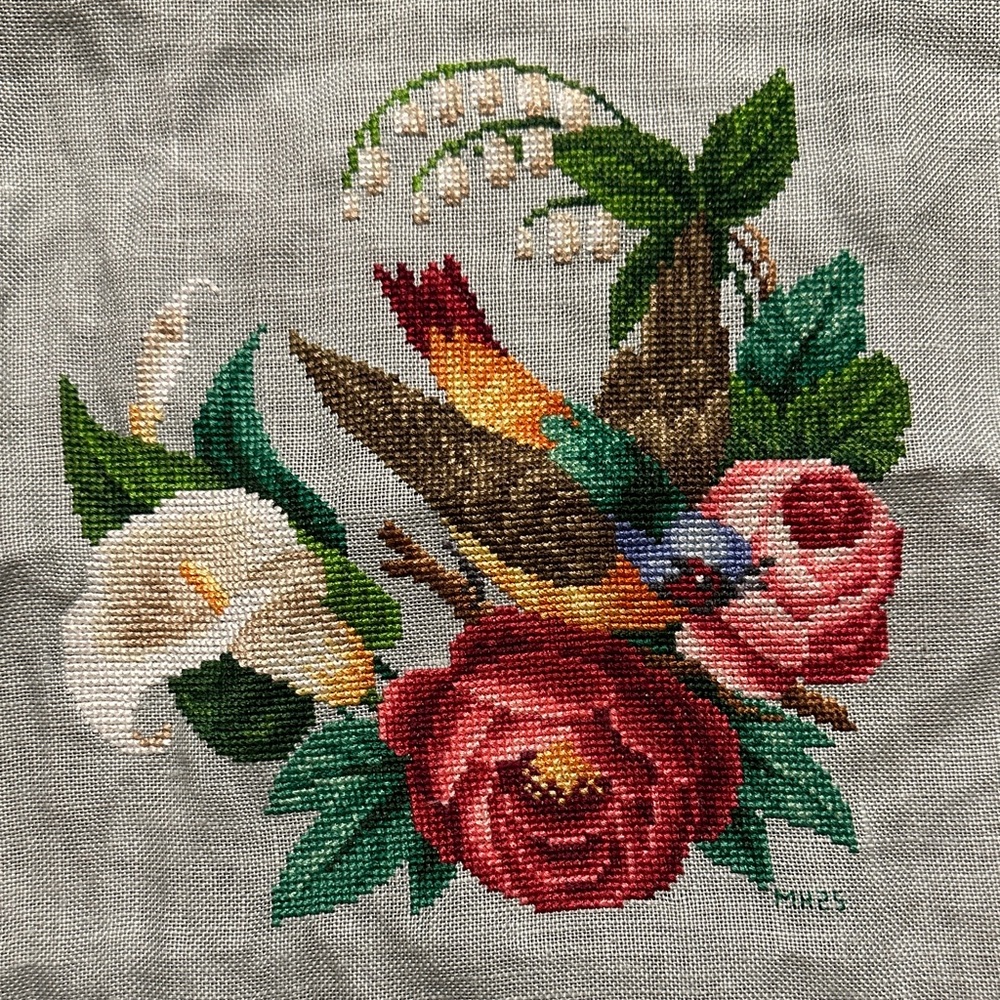 Floral and Bird unframed cross stitch piece on linen